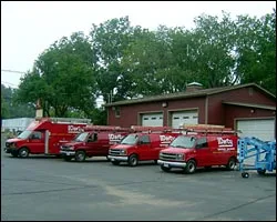 C.F. Darcy Electric service van fleet parked outside the Middleboro shop