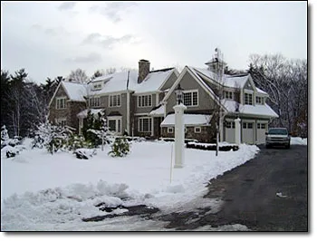 Completed residential electrical project, shingle-style home exterior