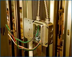 Electrical junction box being wired during a residential remodel